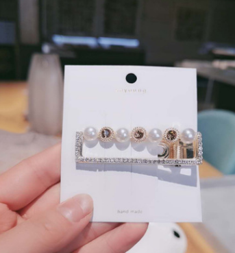 Pearl bangs with diamonds