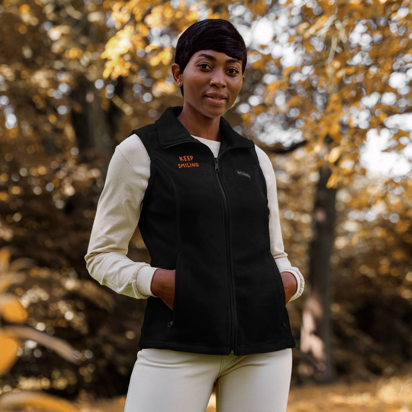 Women’s Columbia fleece vest orange thread embroidery "Keep Smiling"