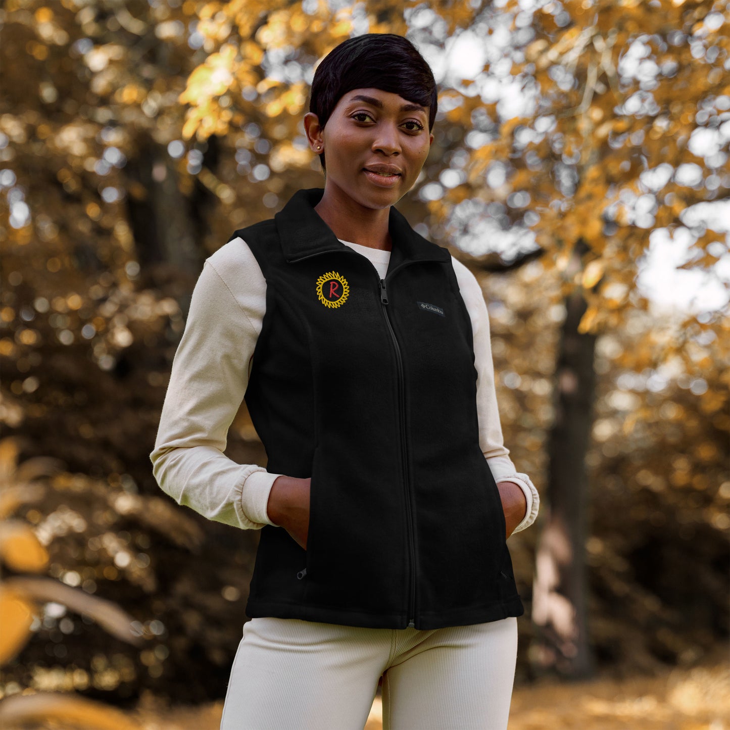 Women’s Columbia fleece vest, gold/red thread embroidery "R" in a custom circle