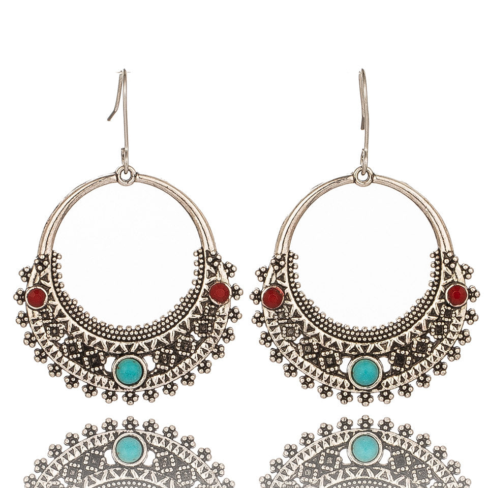 Drop-shaped alloy pendant earrings