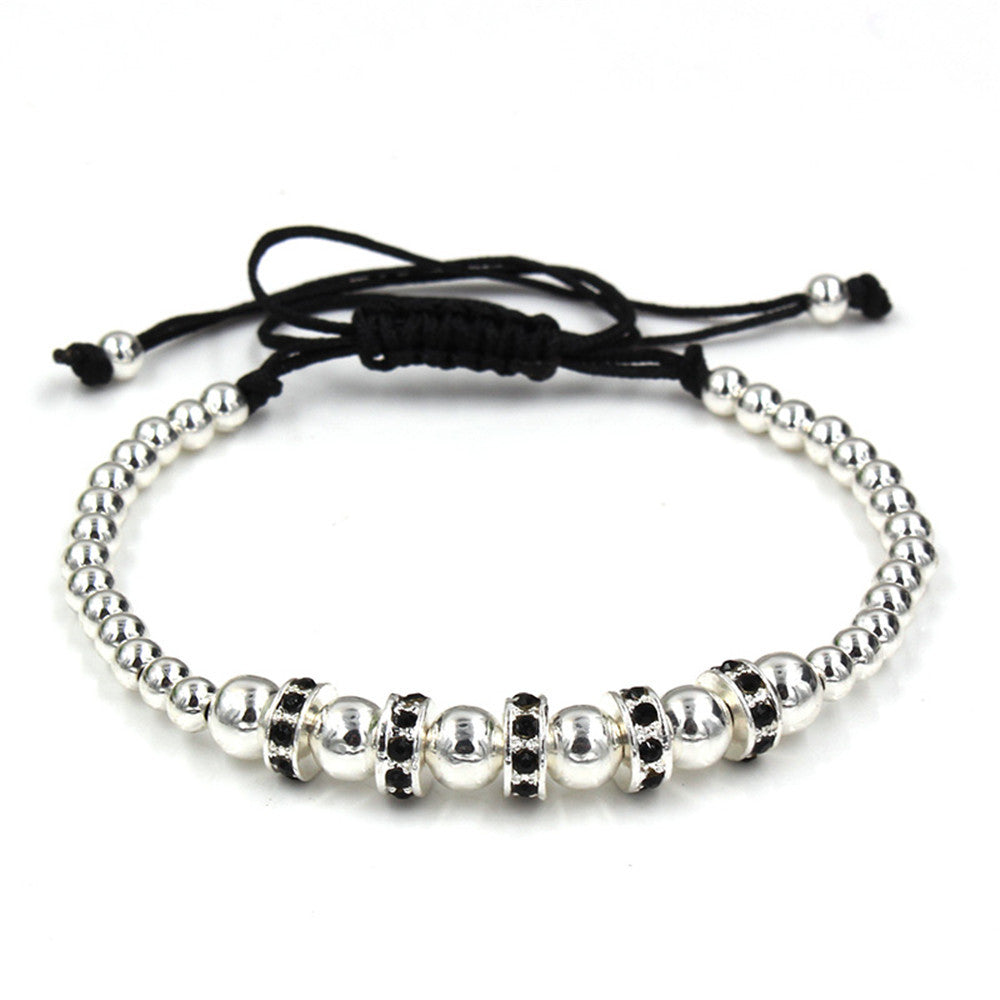 Hand-woven bracelet with diamond spacers