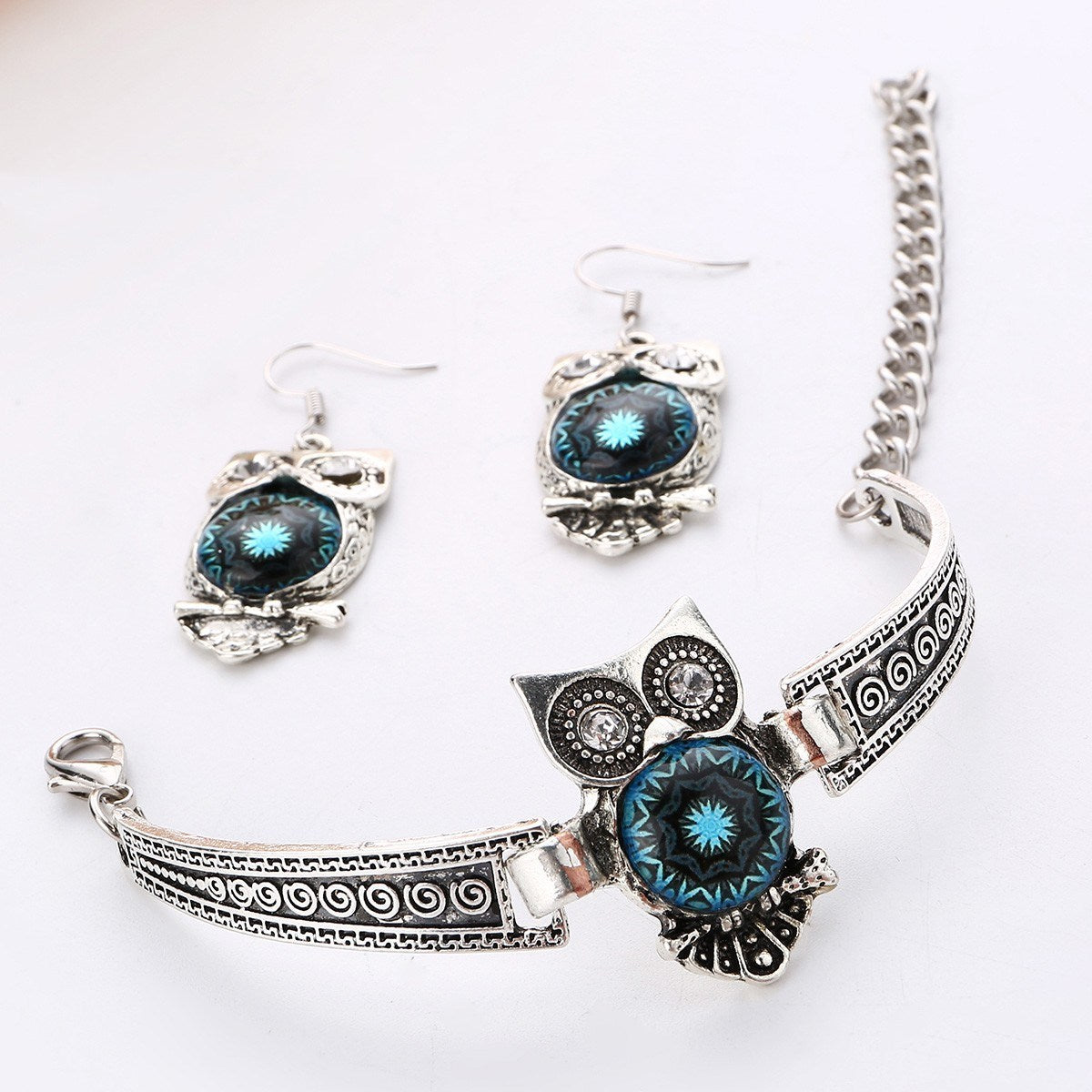 A three-piece bracelet earring necklace