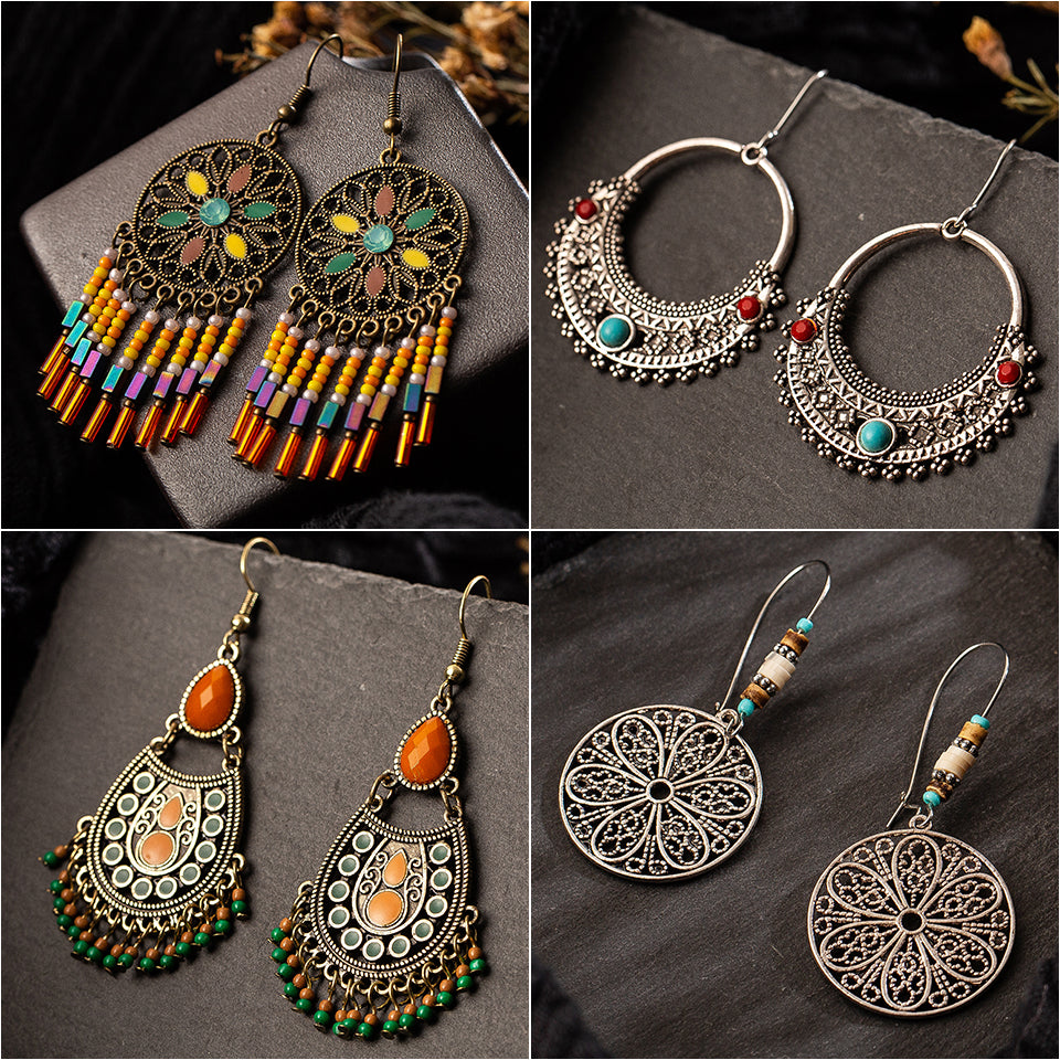 Drop-shaped alloy pendant earrings