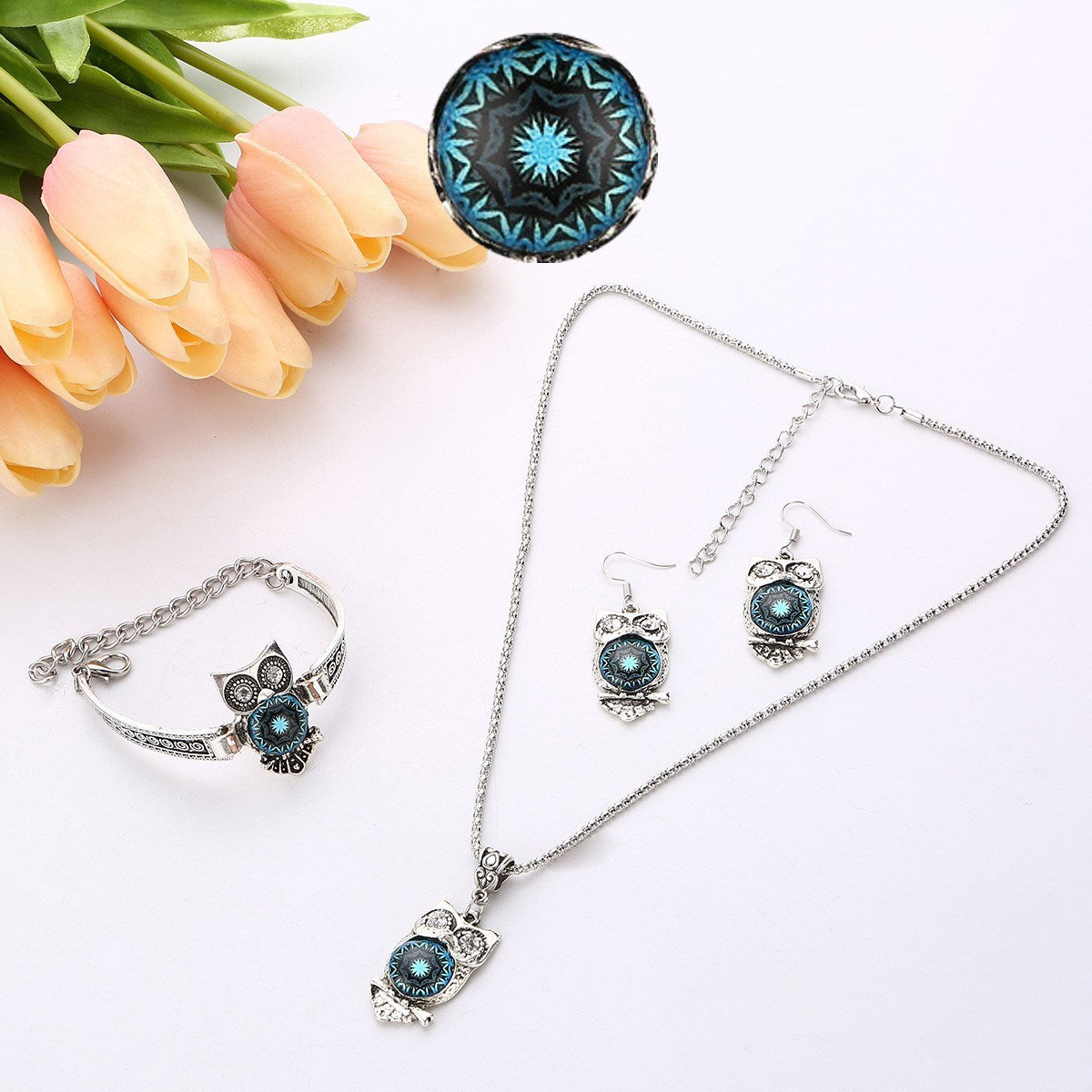 A three-piece bracelet earring necklace