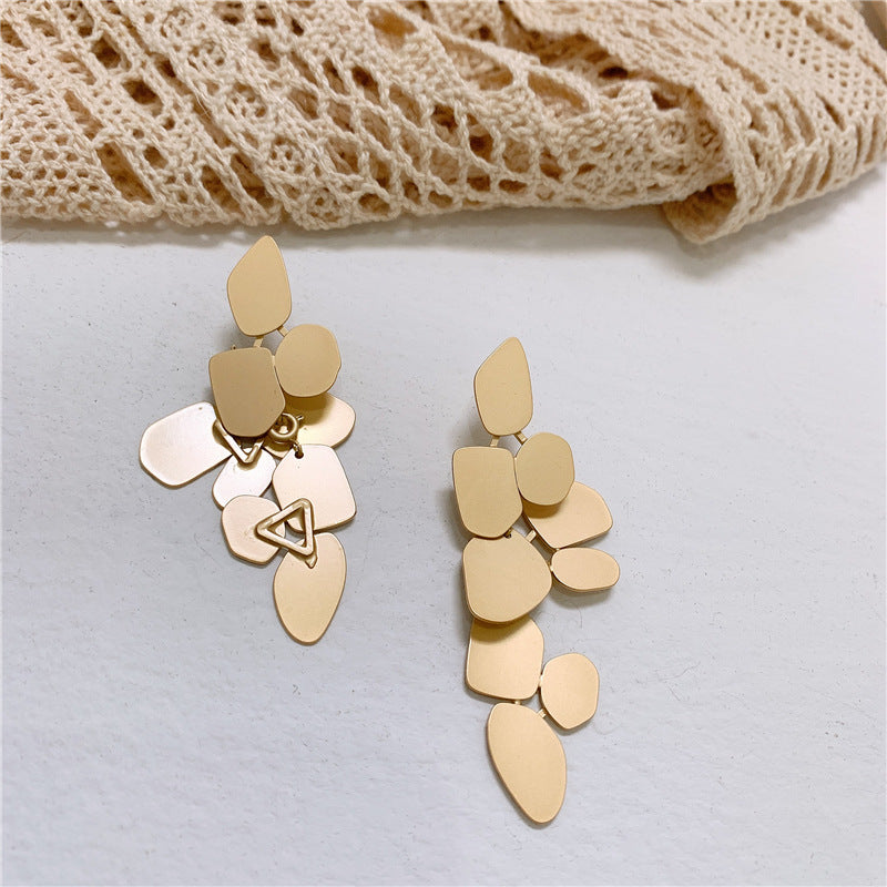 Stitched broken leaf earrings