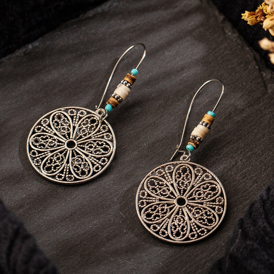 Drop-shaped alloy pendant earrings